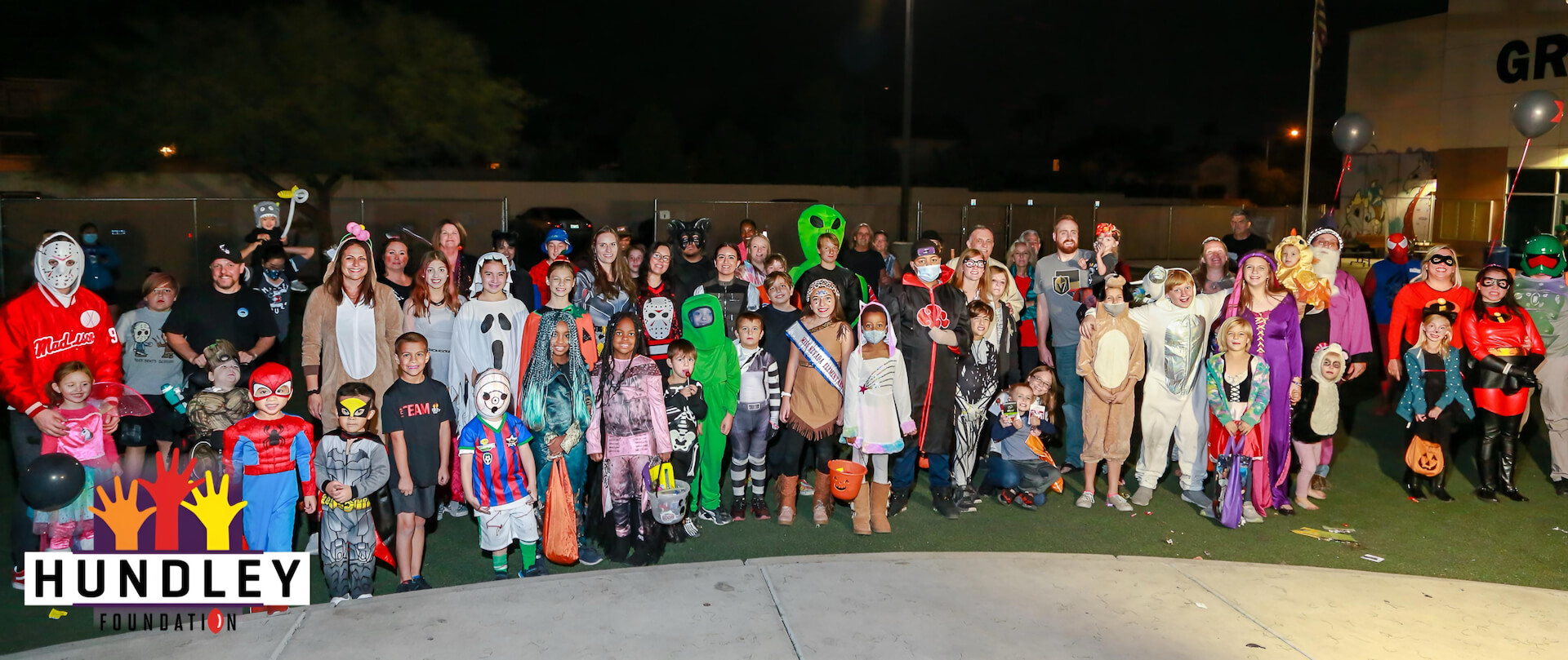 group photo of Spooktacular Halloween Party attendees
